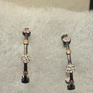 Freida ROTHMAN signature floral station hoop earrings.